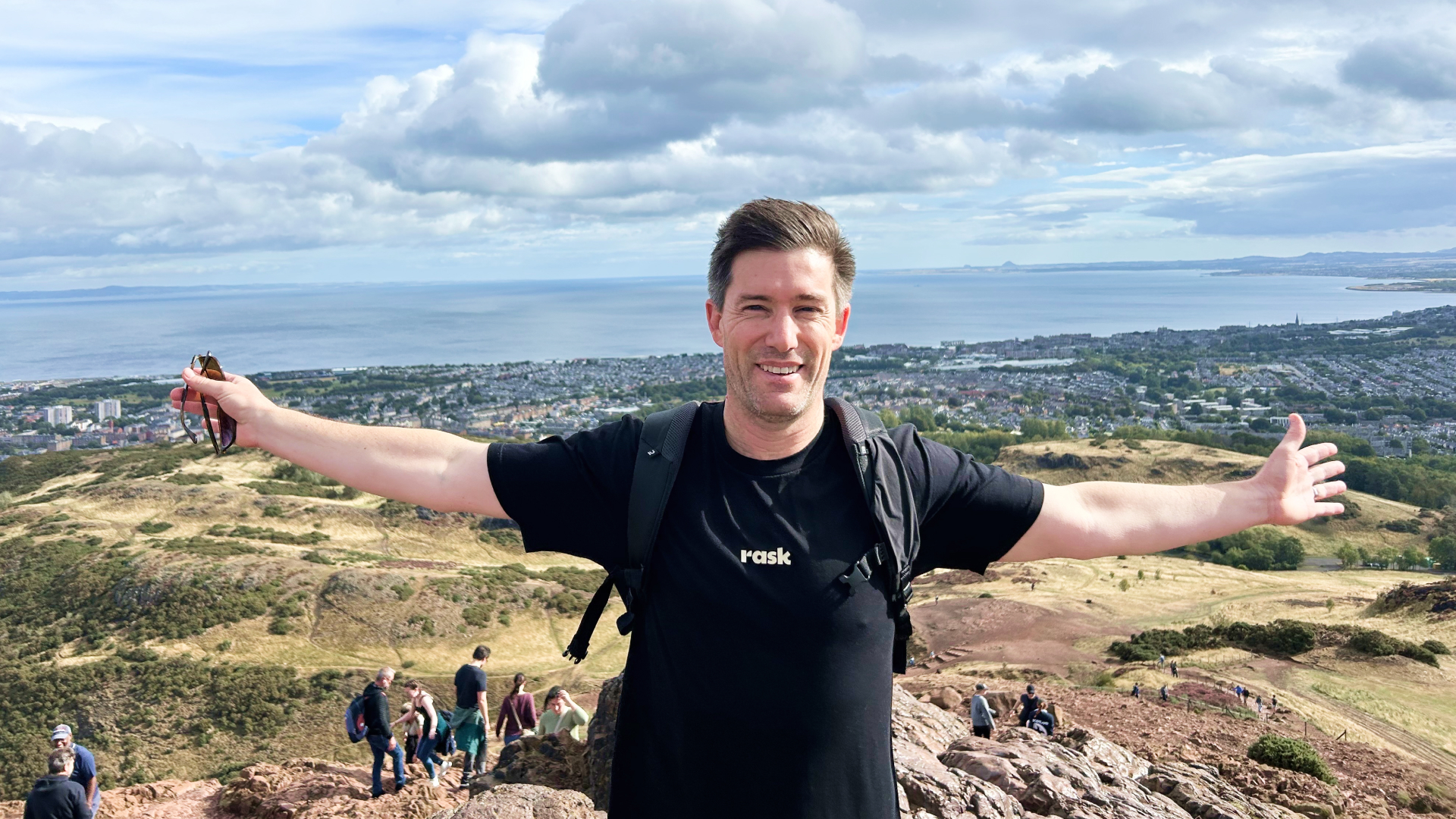 Cameron at the top of Arthur’s Seat, a hike near Edinburgh: "Great view, very windy though."